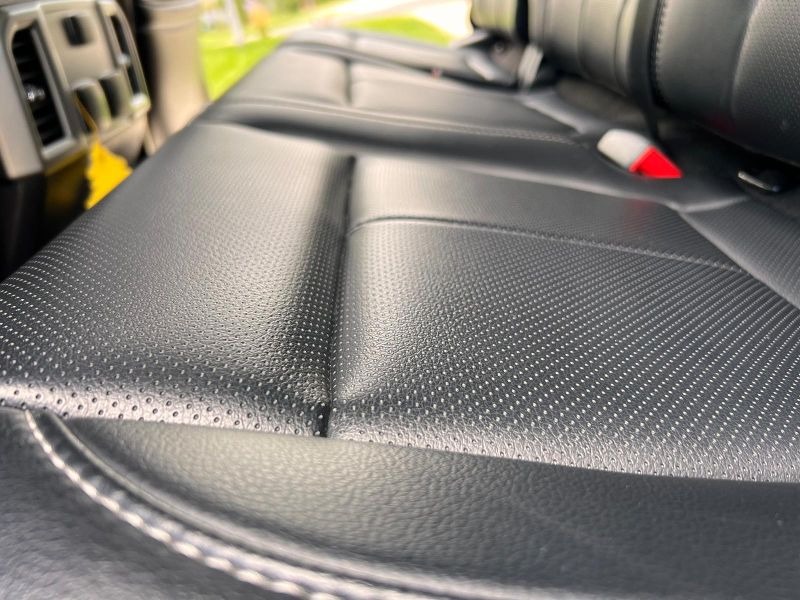 Ford F-150 leather seats after thorough cleaning and conditioning, restoring their rich color, smooth texture, and long-lasting protection for a comfortable, like-new appearance