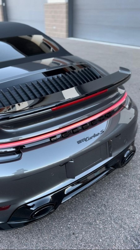 Porsche 911 Turbo S with an incredible ceramic coating finish, showcasing a glossy, high-shine surface that provides unmatched protection against scratches, contaminants, and water spots, ensuring long-lasting durability and a flawless appearance
