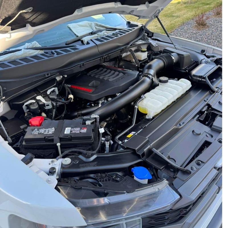 Engine bay detailing in Castle Pines Co - deep cleaned engine after full detail package